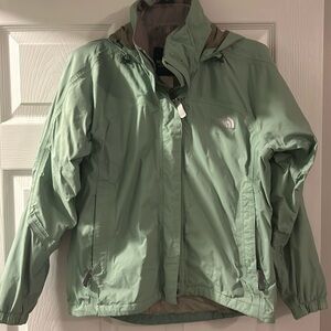 Size XS North Face green raincoat, good condition